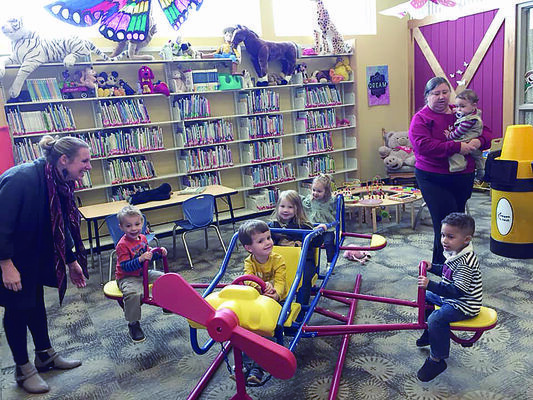 Rusk Public Library’s youngest patrons enjoy the airplane in the Children’s library room, thanks to Rusk resident Jeanie Swink, who donated the plane and other play ground equipment to the library and Jim Hogg Park.