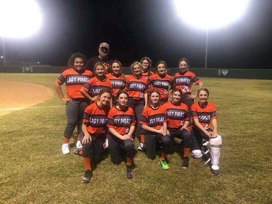 Wells Junior High Lady Pirates wind down after winning the inaugural game of the school’s new softball program. The Lady Pirates won their Oct. 8 double-header against Central Heights. 

Photo courtesy of Kacie Collins