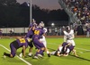– Roughriders take keep the Eagle offense from protecting their ball carrier in a well-fought match held Friday in Center. 

Jo Anne Embleton/Cherokeean Herald