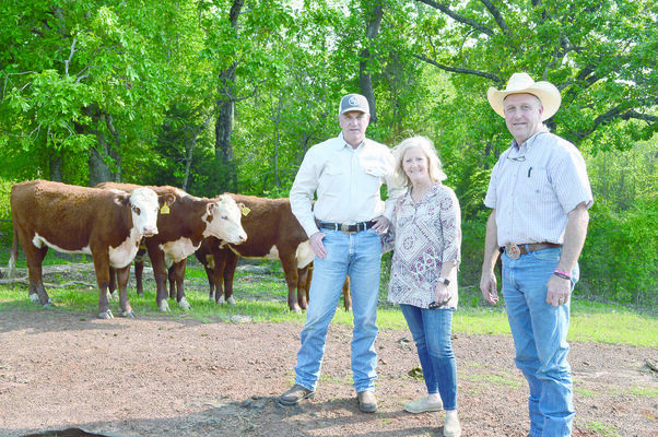 Bryan and Sarah Selden (left) will be recognized by Preston Lindsey (right), director of zone 1 of the Cherokee County Soil &amp; Water Conservation District, for Land Reclamation and Cattle Production at the annual awards banquet May 4 in Jacksonville.