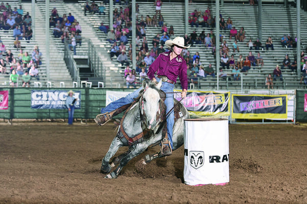 Reagan Davis of Alto cuts around a barrel during her 16.922 ride on Sunday. Davis is also participating in pole bending and breakaway roping events.