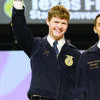 Alto native and former Texas FFA officer Creager Davis salutes the crowd during the 89th annual Texas FFA State Convention, held July 10-14 in Corpus Christi. Davis recently finished his term as state vice-president with the Texas FFA.