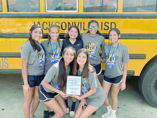 Courtesy Photo
The Jacksonville Maidens varsity cross country team displays the hardware brought home from the 6A-5A Union Grove Invitational meet Saturday, Aug. 24.