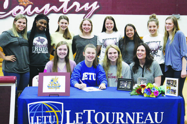 Courtesy Photo
Natalie Davenport, pictured with her teammates, on National Signing Day.