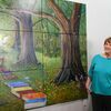 Photo by Cristin Parker
Alto artist Marilyn Nowell shows off the mural she painted for Alto’s Stella Hill Memorial Library. The nine-panel artwork is on display in the library’s children’s section.