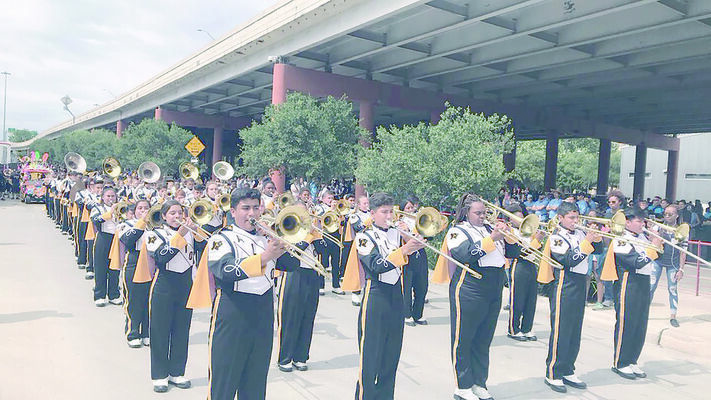 The Alto High School Mean Sting Music Machine brings home a first place award for Out of Town Band after their recent trip to San Antonio where they marched in the Battle of the Flowers Parade.
