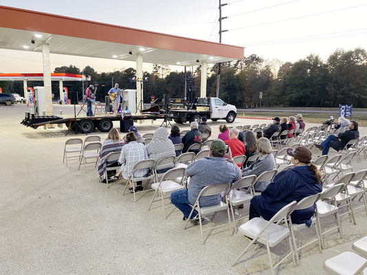 Community members enjoyed hamburgers and a concert by Ian Chandler to honor veterans during Truckerz Veterans Day celebration.