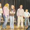 County spelling bee contestants line up to receive their participation ribbons. Spellers from Alto, Rusk and New Summerfield all competed.
