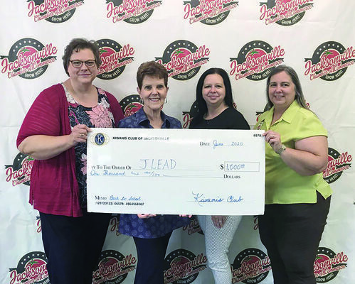 Courtesy photo
Jacksonville Chamber of Commerce Education Division Chair Pam Anderson, far right, recently accepts a $1,000 donation from the Jacksonville Kiwanis Club for the Back 2 School project. Also pictured, from left, are Kiwanians Karen Nolley, Judy Batton and Tabatha Baker Ainsworth.