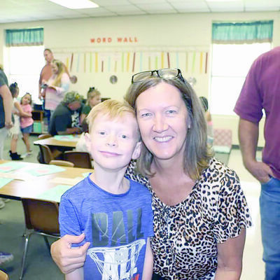 Kingston Gonzalez with his Gigi, Rhonda Dover during the Grandparent’s Day cookie social held at his school.
