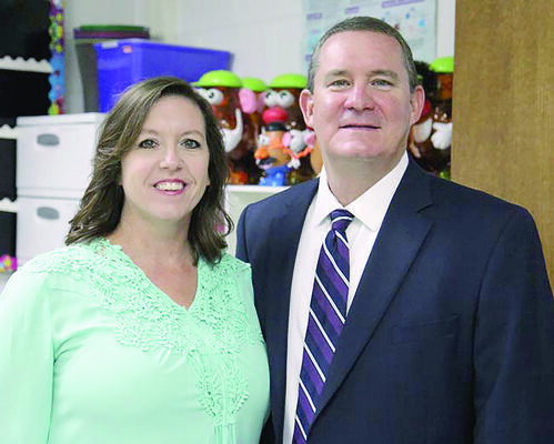 Courtesy Photo
Pictured, from left, are Karyn Ard and Bobby Dyess, THS principal.