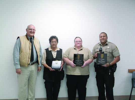 Courtesy Photo
Pictured from left to right are Sheriff James Campbell, Sgt. Annette Gonzalez, Jailer of the Year; Merideth Bingham, Dispatcher of the Year;  and Cody Rodriguez, Law Enforcement Officer of the Year.