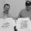 Alto Head Coach Keith Gardner and Assistant Coach John Paul Dixon show off the t-shirts given away by the Reebok Tailgate crew. Reebok visited Alto on Oct. 12. PHOTO: LEANN JONES