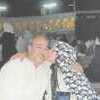 Jackie Ardi receives a kiss from his mother, Sarah Ardi, during a recent trip to Mecca. Mr. Ardi, a member of the Church of Christ, took his mother on the pilgrimage for Mother's Day.