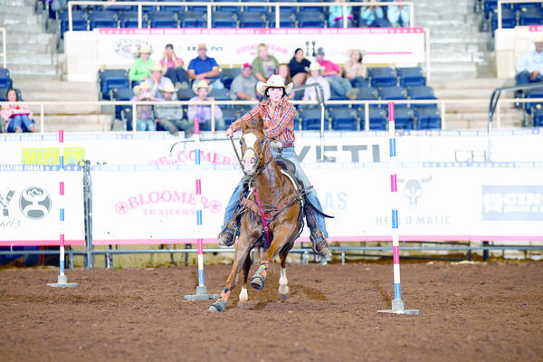 Courtesy photos

Alto’s Reagan Davis navigates the pole bending course during the Texas High School Rodeo Association’s State Finals, held recently in Abilene. Davis walked away from the competition with two state titles.