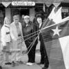 Rusk Rotarians placed the Texas and American flags around the square on Texas Independence Day. From left are Toni Meador, Houston White, Louraiseal McDonald and Connie Brown. Roy Reynolds is not pictured.
