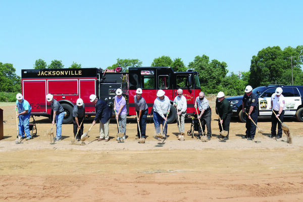 Jacksonville City Council members, city staff and other construction project officials break ground at the site of the city’s new public safety complex Wednesday, June 17.
