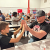 Rusk Intermediate School students joined by their dads or other father-figures recently were guests at a Dad and Pizza night at the school, an event that launched the beginning of a Watch D.O.G.S. program on campus, designed to bring male mentors to the campus. 

Photo courtesy of Rusk Intermediate School