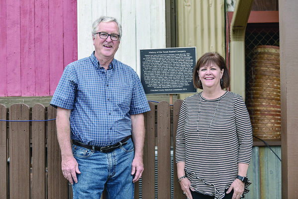 Photo by JTP Photography
Texas Basket Company owners Martin and Jackie Swanson get a shot with the historical marker th Cherokee County Historical Commission is in the process of installing at the Jacksonville business.