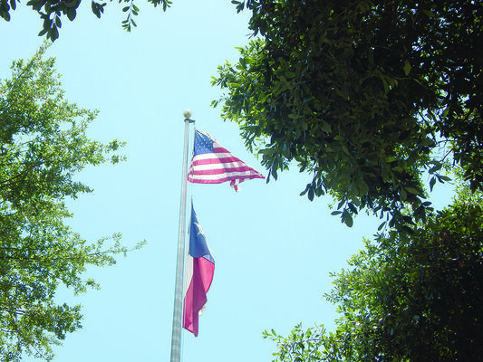 Old Glory, the nickname given to the  American flag by William  Drive,  proudly waves in the breeze above the Cherokee County Courthouse   lawn in Rusk.