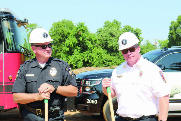 JPD Chief Joe Williams, left, and JFD Chief Keith Fortner get ready to officially kick off construction of a new facility for both their departments.