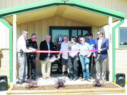 Photo by Michelle Dillon
Jacksonville Councilman and Mayor-elect Randy Gorham, center, cuts the ribbon at the grand opening of the city’s new animal shelter, located at 208 Tena St., in Jacksonville.