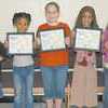 Alto Elementary School honored its students of the month with breakfast before school Friday. The parents, teachers and the honorees were served doughnuts and juice. Each student received a framed certificate to celebrate their hard work for the month of September. Students of the month (from left) are: Ryan Griffith (Shelley Clevenger's Kindergarten class), Tionna Richardson (Misty Duplichain's First Grade class), Alexa Russo (Linda Skinner's Fourth Grade class), Mia Skinner (Lisa Low's Second Grade class) and Vanessa Salgado (Janet Moore's Third Grade class). COURTESY PHOTO