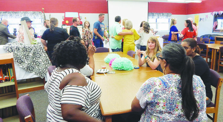 RISD staff, family and friends of Mrs. Clayton attended the reception held in her honor May 17 at the Rusk Intermediate Library.