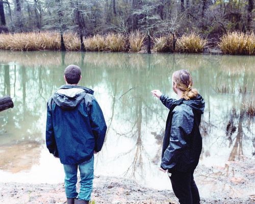 Christian Roper and Brackston McKnight lay eyes on Hendricks Lake, the alleged locale of sunken pirate treasure. The duo are currently working to make a documentary about the local legend of sunken silver ingots in the lake near Tatum.