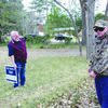 Photo by Cristin Parker
Rusk District 5 Councilman Jan Pate, left, and District 5 resident Bill Holland measure the distance between the edge of the pavement on Euclid Street to a yard sign placed along the street last week, to make sure it’s not in the public right-of-way. Councilman Pate and Rusk City Manager Jim Dunaway agreed the proper placement of signs along Euclid Street is at least seven feet from the street.
