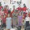 JISD's Fred Douglass Elementary School fourth graders entertain family and friends with songs of Christmas during their "Christmas Around the World" concert Dec. 20.