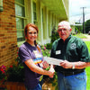 Ally Bernard is presented a check by Robert Selman of the Master Gardeners Association. Ally will attend Angelina College in Lufkin where she will major in animal science.  She is the daughter of Jennifer Bernard of Alto.