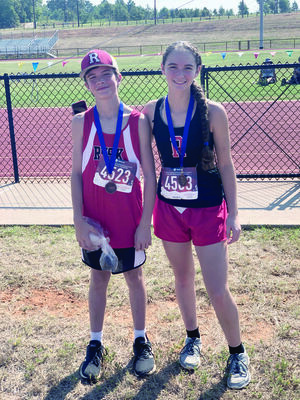 Courtesy photos
Rusk runners Kaleb Baldwin, left, and Madelene Baldwin show off their hardware they won in the East Texas Invitational.