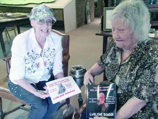 Photo by Cristin Parker
Lurlene Bowden, left and Cherokee native Barbara White show off Bowden’s newest historic cookbooks featuring White’s Cherokee history and family recipes.