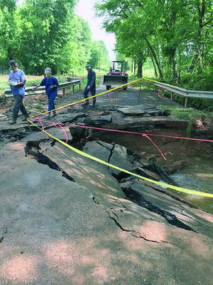 One roadway in Precinct 2 sustained substantial damage after heavy rainfall caused flash flooding across Cherokee County.