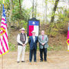 A small group of Cherokee County Historical Commission (CCHC) members met December 15 on the side of U.S. Highway 69 to formally dedicate the Texas State Historical marker for the Sheriff Bill Brunt murder site. Cherokee County Sheriff James Campbell and County Judge Chris Davis joined CCHC member Jim Cromwell prior to the unveiling. Later, about 40 attendees gathered for a reception and program at the CCHC office. Mr. Cromwell spoke and Judge Davis and Sheriff Campbell shared stories as well.  Also in attendance was Mr. and Mrs. Hal Brunt attended. Hal is the son of Frank Brunt.