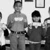 These students all obtained their accelerated reader goal for the second six weeks and were eligible for a $20 drawing. The winners include from left, Tristan Chidester, Jonathan Lopez, Suemichelle Guerrero and Jackie Wallace.