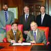 Pictured, Dr. Zhang Jianqiu, president of the Jilin Provincial Academy of Forestry Sciences, seated left, signs the cooperative agreement with Dr. Baker Pattillo, president of SFA. Standing from left are Dr. Matthew McBroom, associate dean of SFA’s Arthur Temple College of Forestry and Agriculture; Dr. Hans Williams, dean of the college; and Dr. Steve Bullard, provost and vice president for academic affairs at SFA.