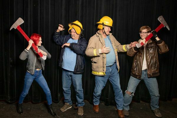 hotos by Heather Beck Photography
Autumn Canty, far left, and Kaleb Ward, far right,  as the eldest Herdmans menace firefighters Jerry Parker and Kent Shuttleworth during a recent rehearsal of ‘The Best Christmas Pageant Ever.’