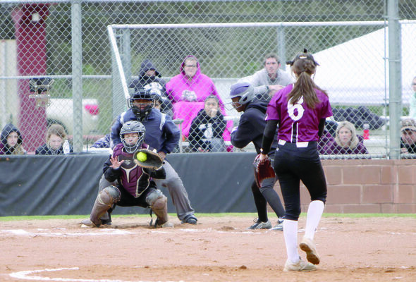 Photo by Shannon Capps
Troup’s Lindsay Davis puts it over the plate and past the Douglass batter in a game Thursday, March 7. Davis put out 15 batters for the night and Troup won, 3-2.