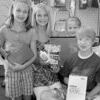 It's time for students and parents to begin shopping for school supplies. From left are McKenna, nine; Madeline, 11; Maggie, six; and Micah, 13. They are the children of Molly and Monte Ethington, owners of Chapman Pharmacy.