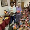 Courtesy photo
Longtime Jacksonville volunteer Fannie Franklin, left and Barbara Hugghins pack holiday baskets for HOPE clients.