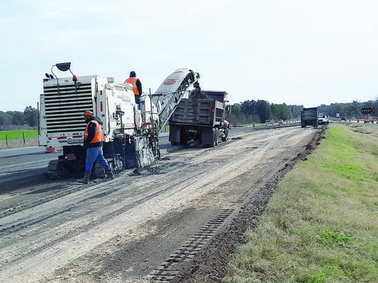 Photo by Cristin Parker
Crewmen continue work on the northbound side of U.S. Hwy. 69 just outside of Wells last week.