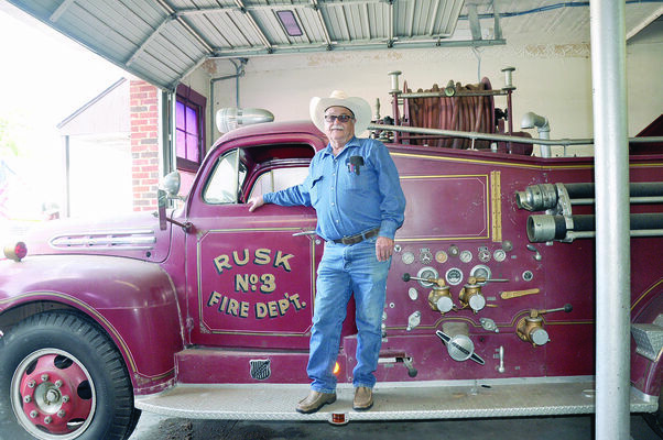 Photo by Betty Marcontell
Rusk Fire Department truck No. 3 was recently moved from the Heritage Center of Cherokee County to a bay in the original Rusk Fire Department Station on Main Street in Rusk. Ricky Cleveland, one of the longest serving volunteer fire fighters was one of the original drivers of the truck which was bought for the Rusk Fire Dept.’s use in January 1951.  Isaacs Wrecker Service was instrumental in moving the truck to its new location.