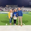 With her proud parents at her side, JHS senior Ava Morris is recognized during Senior Night ceremonies held before game kick-off. Courtesy photo