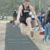 PHOTO: WOLF WHITAKER        Lisa Frauenberger attempts a triple-jump for the Rusk Lady Eagle track team. Frauenberger placed fourth in the event at the Tribe Relays in Jacksonville March 13.