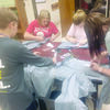 The Rusk FFA served the Cherokee County community with their annual “Week of Service,” held Sept. 25-29. Above, members cut blue jeans to create shoes for Sole Hope, which is a program that sends shoes to Uganda to protect against the Chigoe flea.