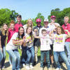 Members of the Rusk baseball and softball teams show off their strength standing next to Caleb Whitely (front row, third from left). Caleb, a third-grader, has beaten two forms of leukemia. The teams recognized him by naming him an honorary captain for their playoff games – baseball against Spring Hill and softball against Atlanta. Caleb threw out the first pitch at game one of the Rusk-Spring Hill game.